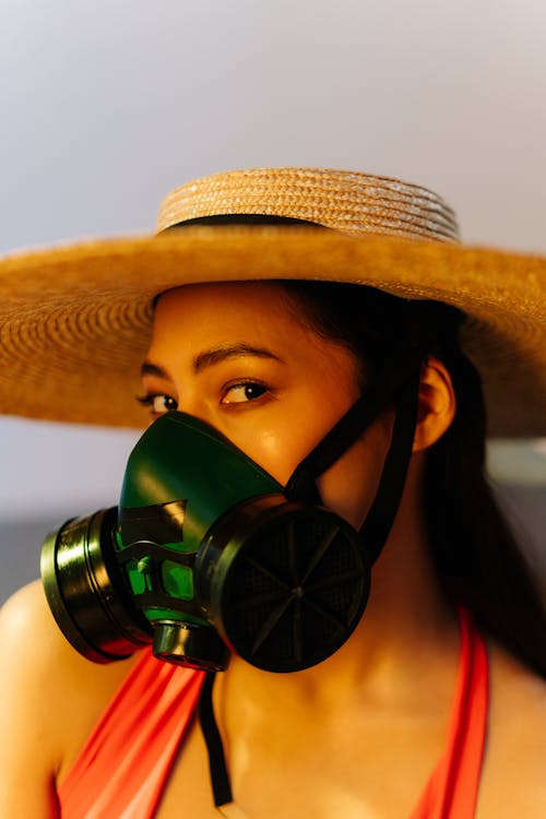 Free Close Up Photo of a Woman Wearing Respirator Stock Photo