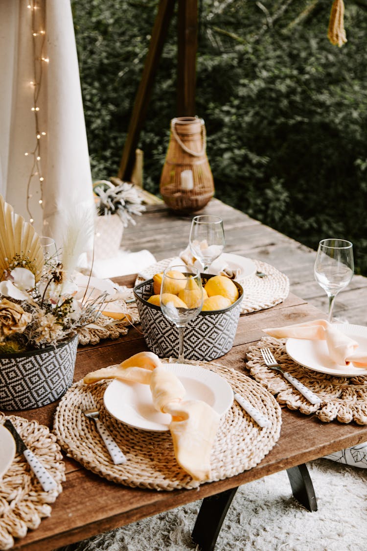 Decorated Rustic Dinner Table In A Yard