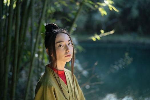 Elegant portrait of a woman in a kimono, surrounded by nature in a tranquil Japanese garden.