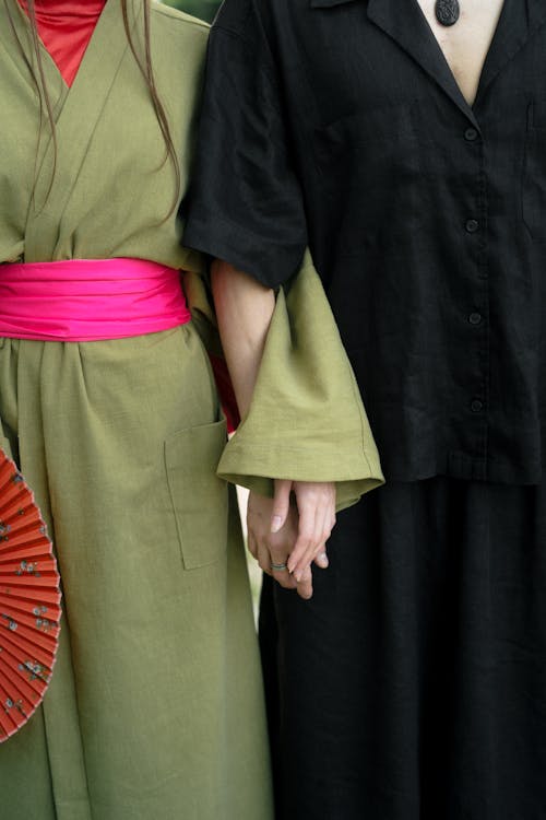 Crop Photo Of Man And Woman Holding Hands