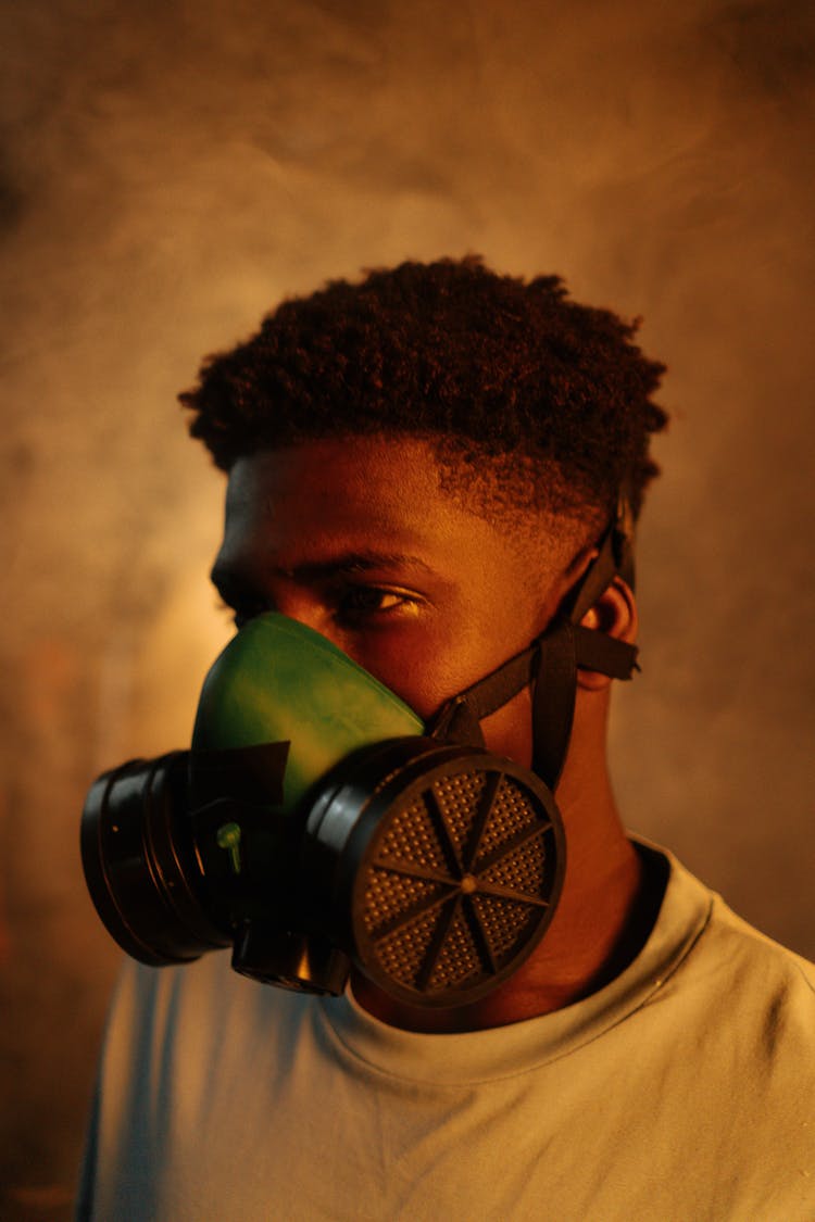 Man In White Shirt Wearing Respirator