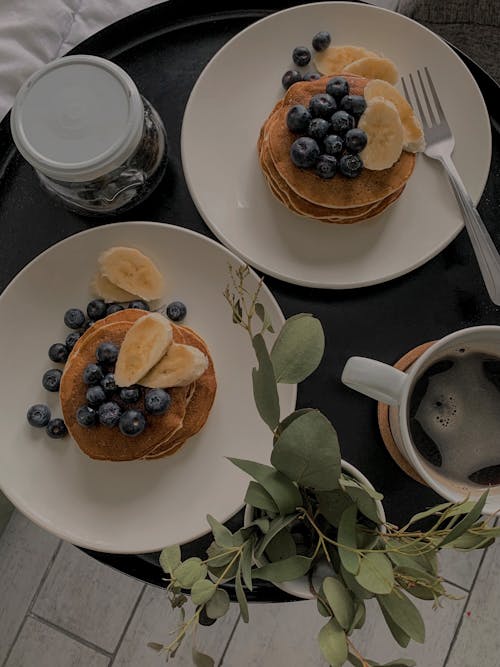 Free Overhead Shot of Plates with Fruits and Pancakes Stock Photo