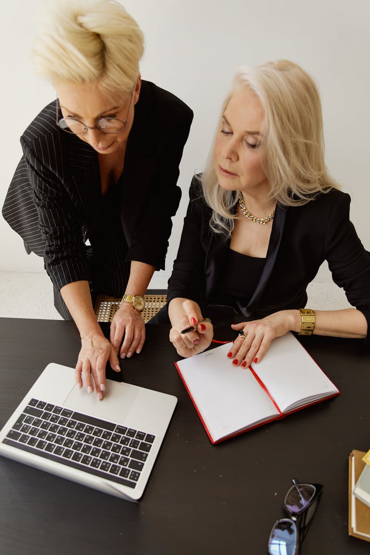 Women In Black Suit Busy Working