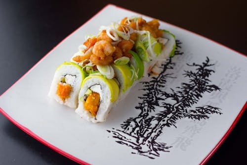 Sushi Rolls on a Square Ceramic Plate