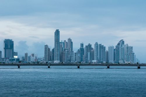 Free Captivating view of Panama City's modern skyline with the ocean in the foreground. Stock Photo