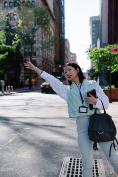 Woman Calling Taxi on Street