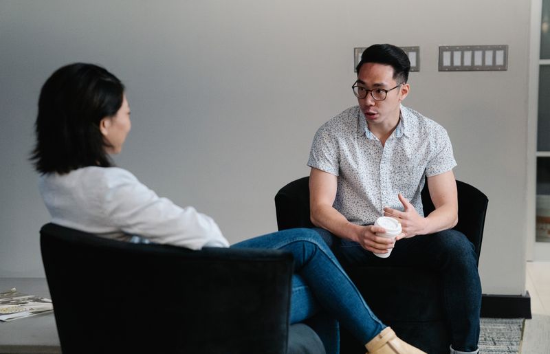 A Navigator talking through options with an employee