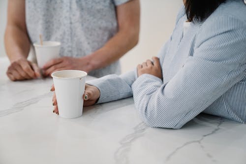 Person holding a Disposable Cup 