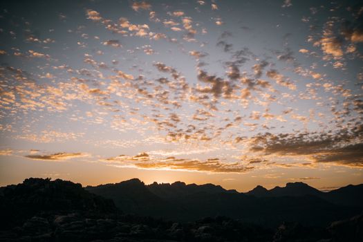Silhouette of Mountains Under Blue Sky during Sunset