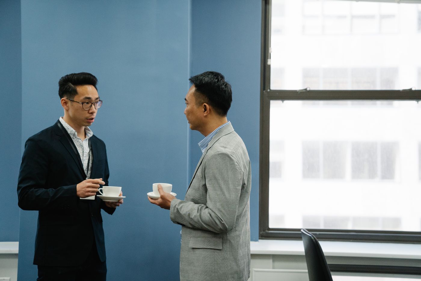 Two professionals in conversation