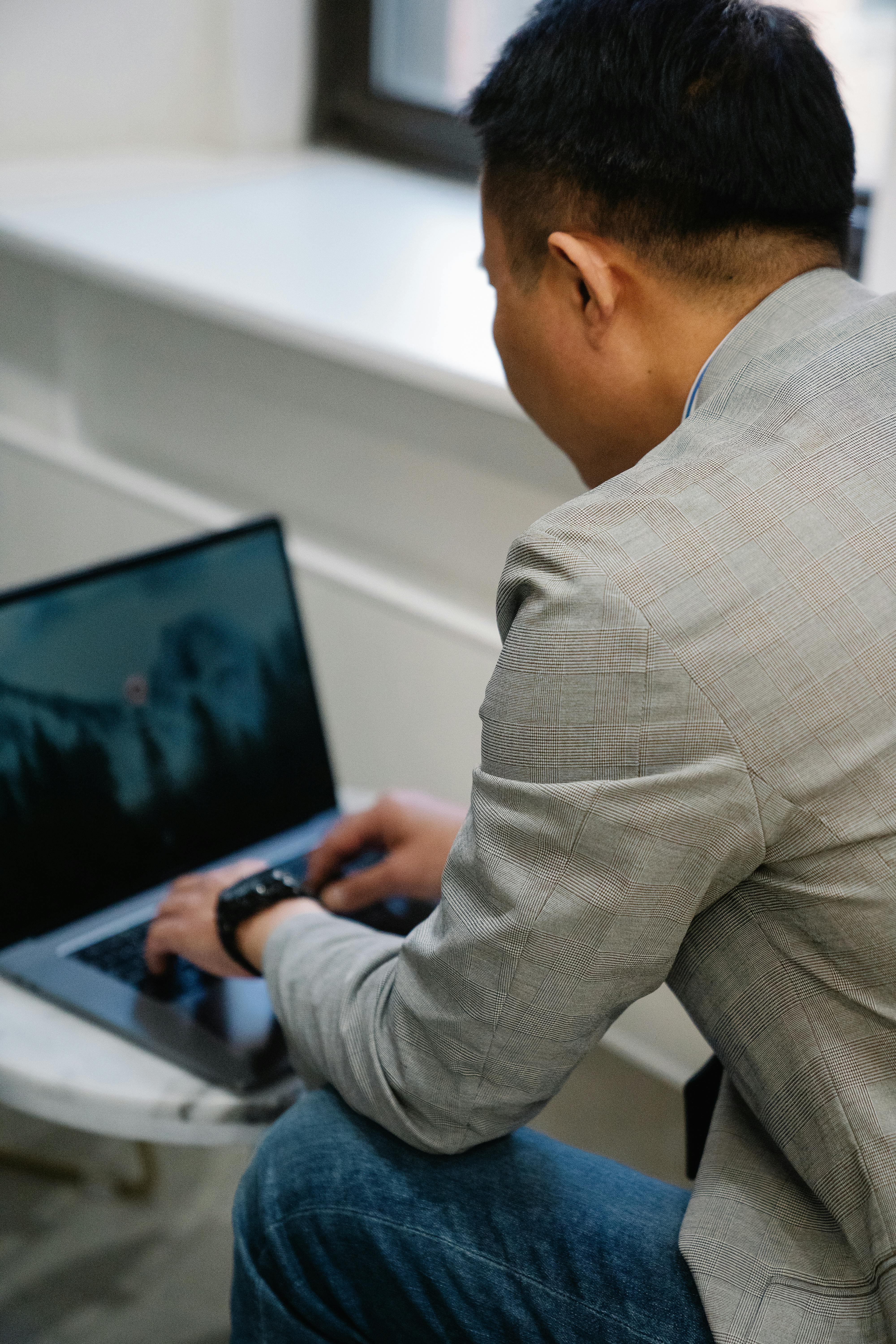 man working on laptop