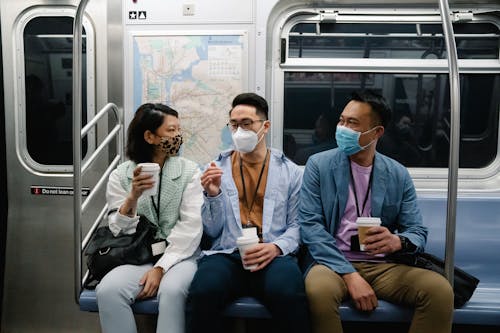 People Sitting Inside a Train