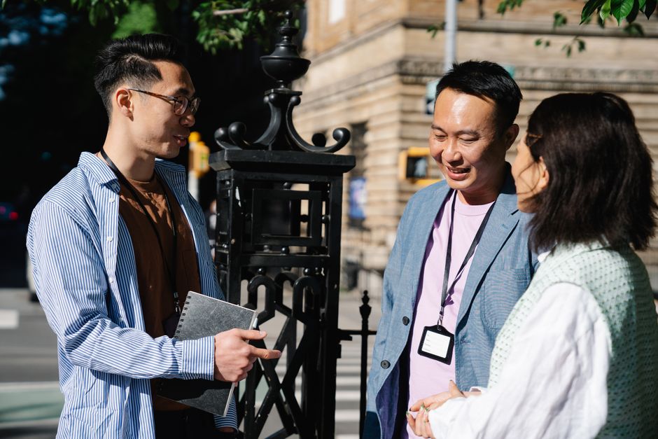 diverse people talking street corner