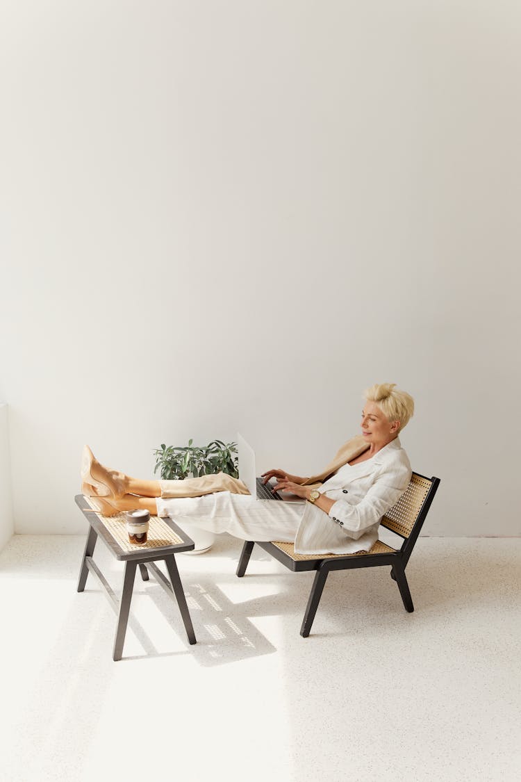 A Businesswoman Relaxing On A Bench