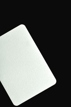 White card on black background with textural detail, ideal for design mockups.