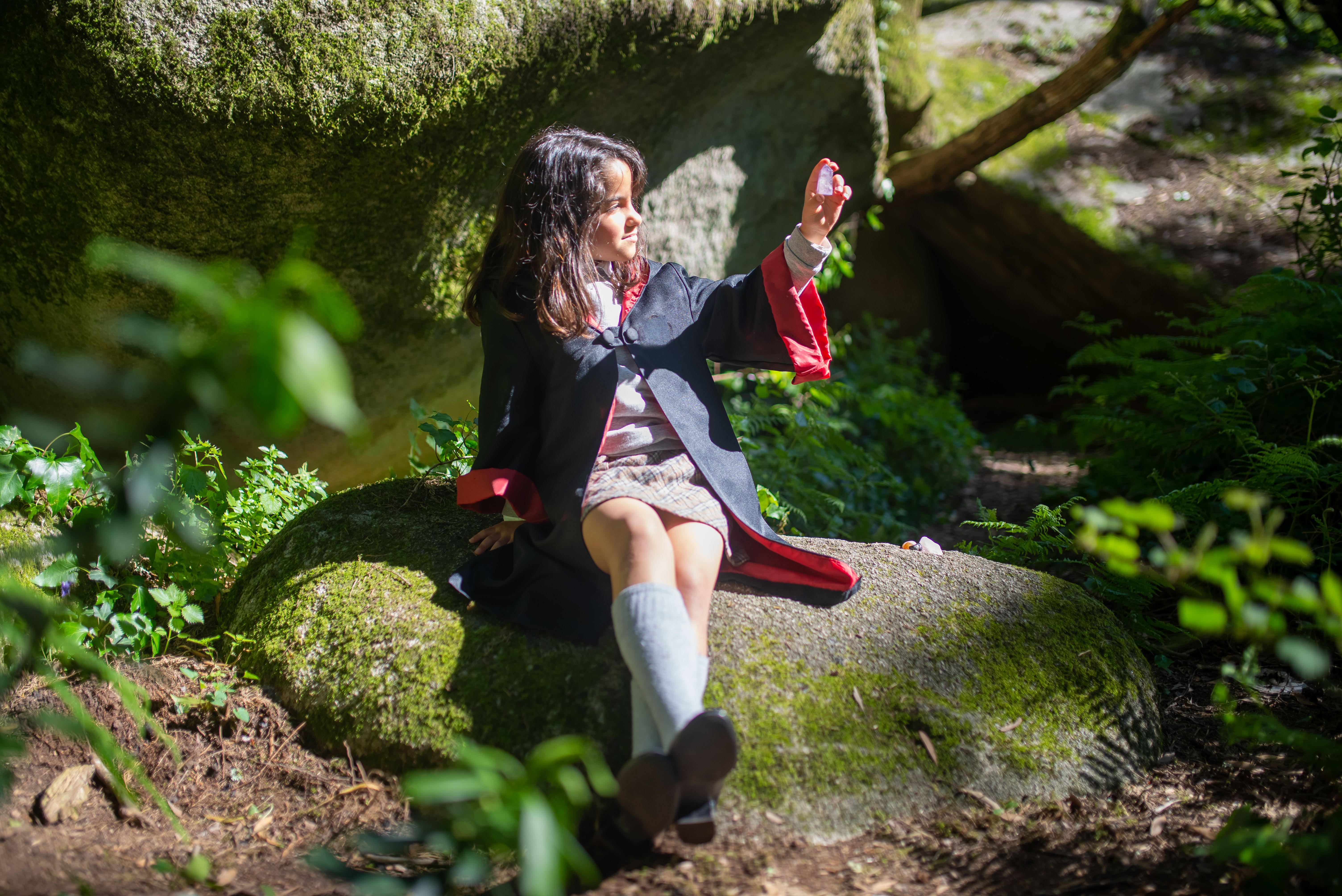 Child reading outdoors