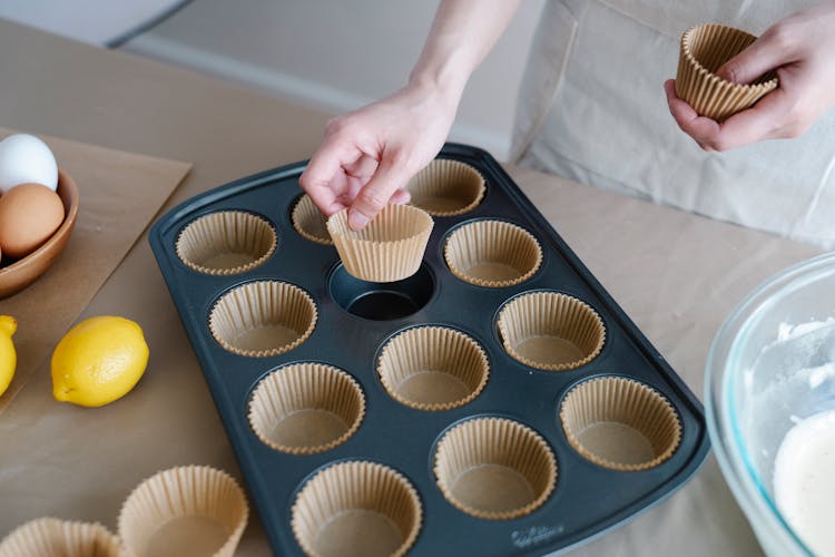 Female Hands Preparing Tray For Cooking