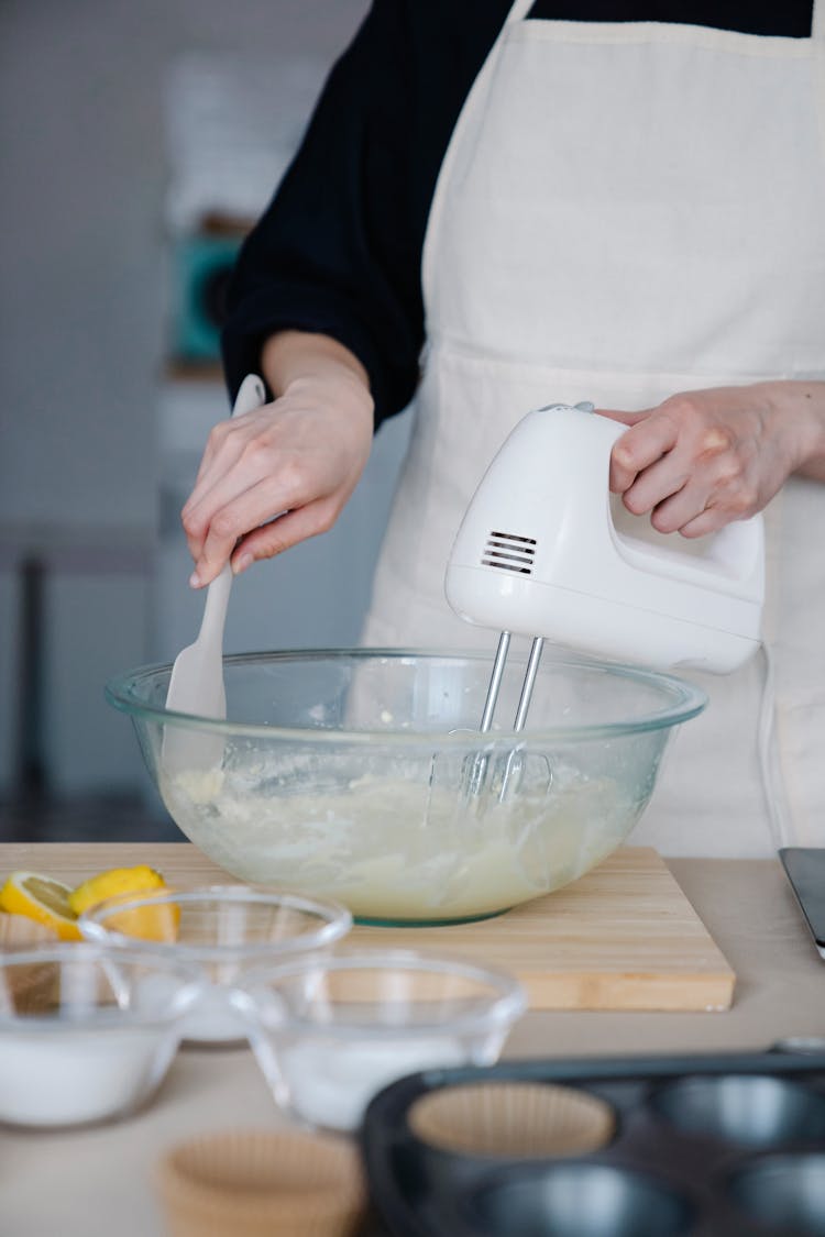 Woman Cooking With Mixer