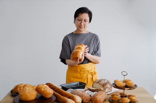 Kostenloses Stock Foto zu asiatische frau, bäcker, brille