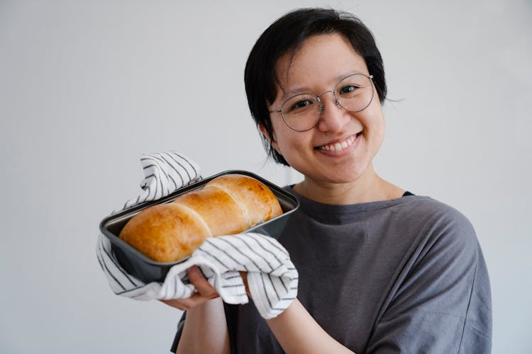 Happy Woman Holding A Tray