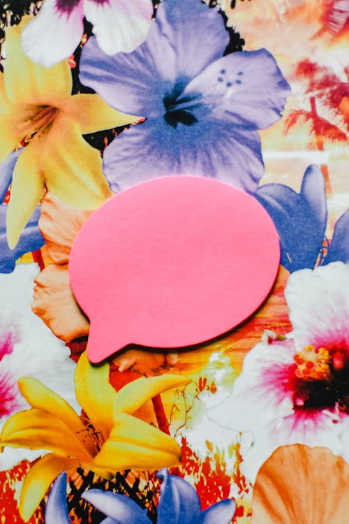 Pink Speech Bubble against a Floral Background