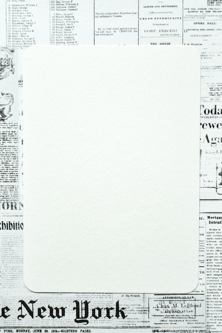 White Blank Paper On Newspaper