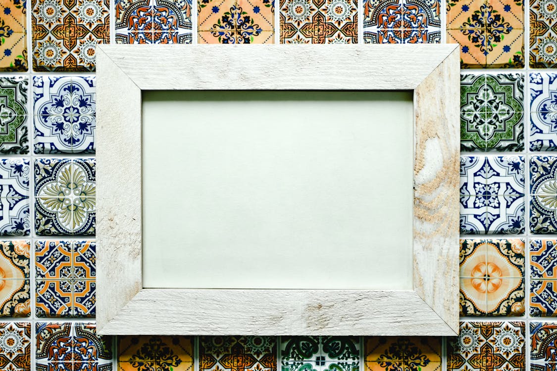 Empty Frame on the Background of Mosaic Tiles 