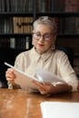 Professional Drama Professor looking at a Script