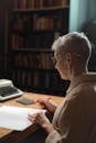 Professional Drama Professor looking at a Script