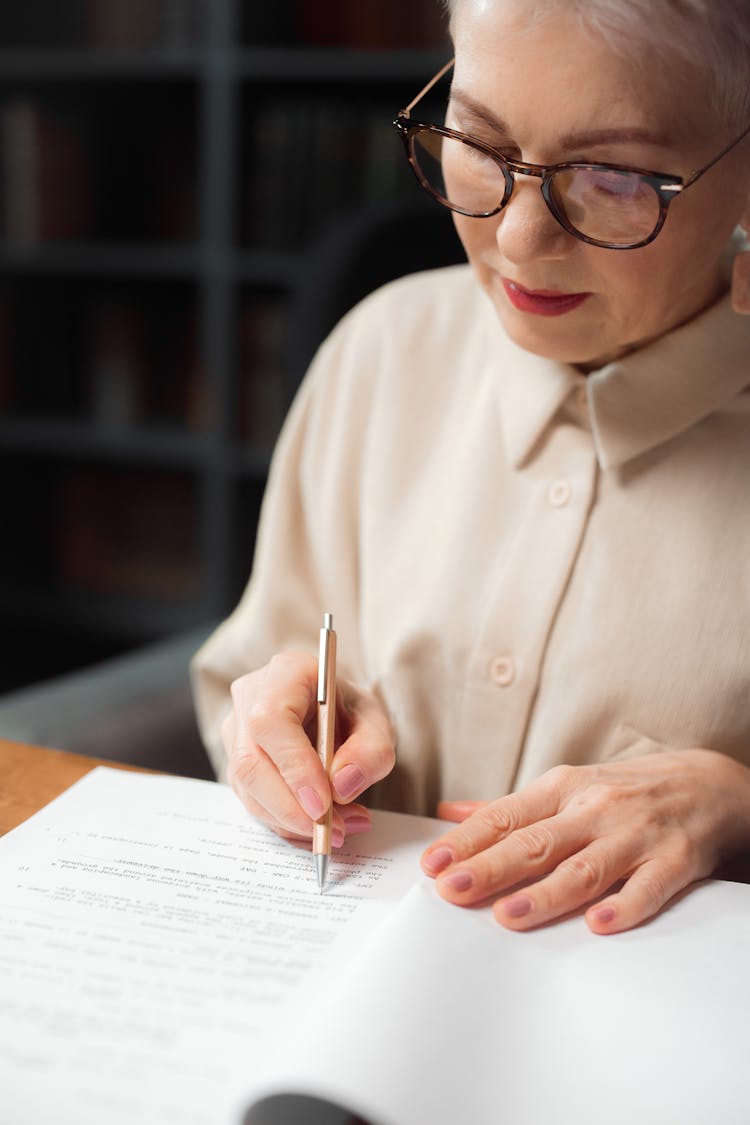 Professional Drama Professor Looking At A Script