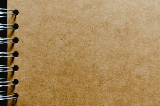 Extreme Close-up Photo of Kraft Notebook 