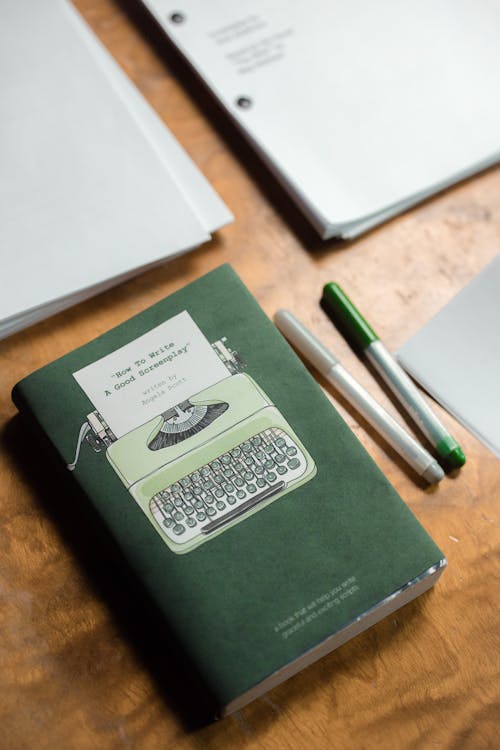 Book over Wooden Table