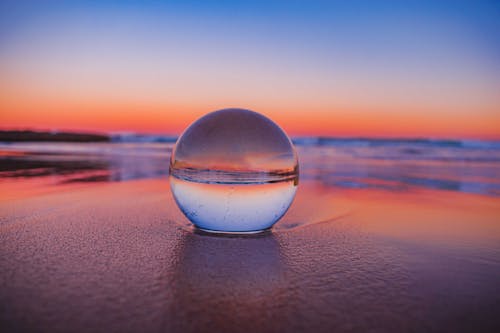 Close-Up Shot of a Lensball on the Beach