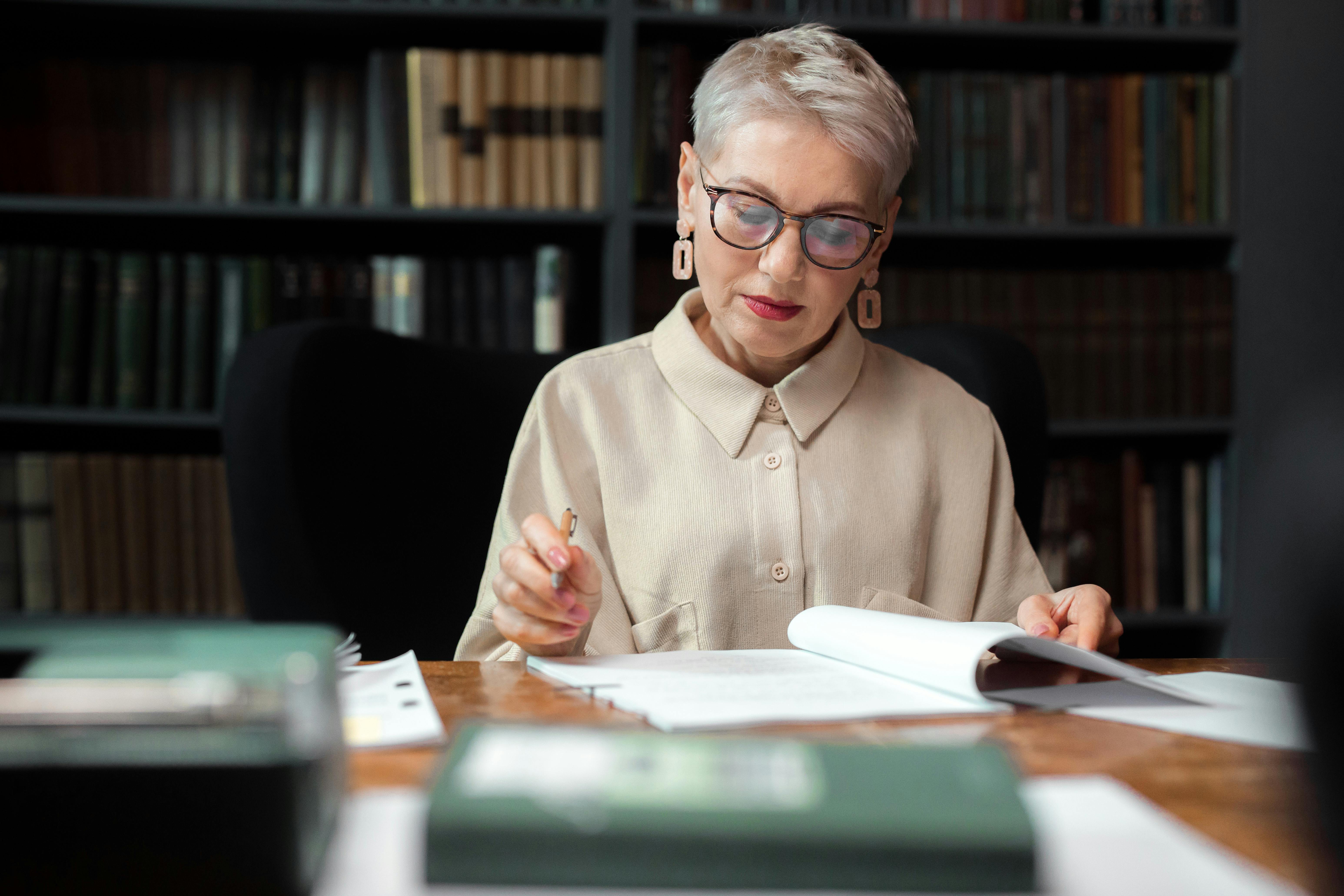 Woman in Beige Top Reading