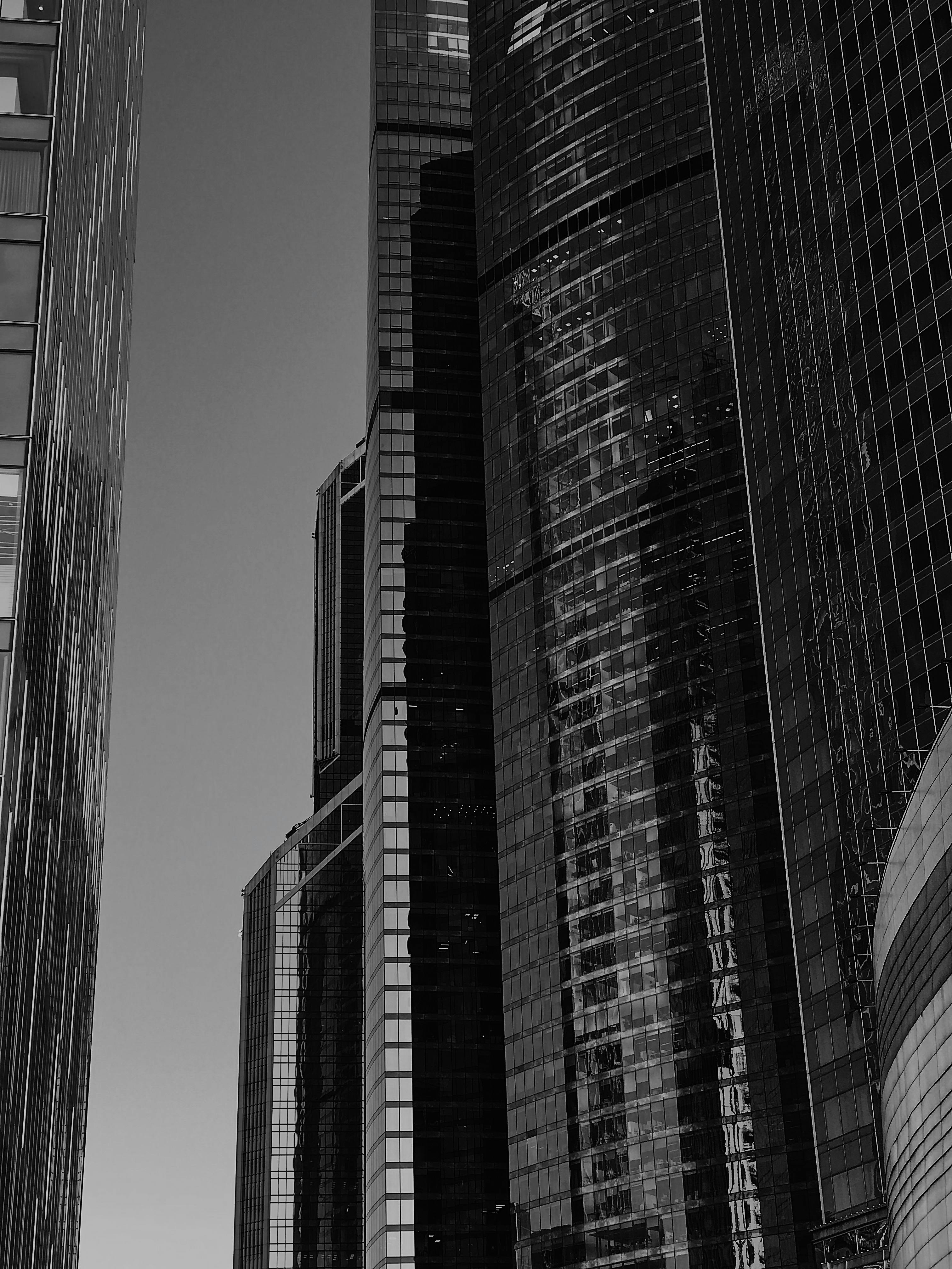 Striking black and white image of Moscow City skyscrapers showcasing modern architecture.