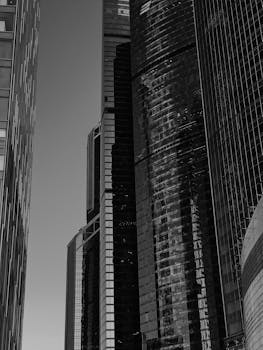 Striking black and white image of Moscow City skyscrapers showcasing modern architecture.