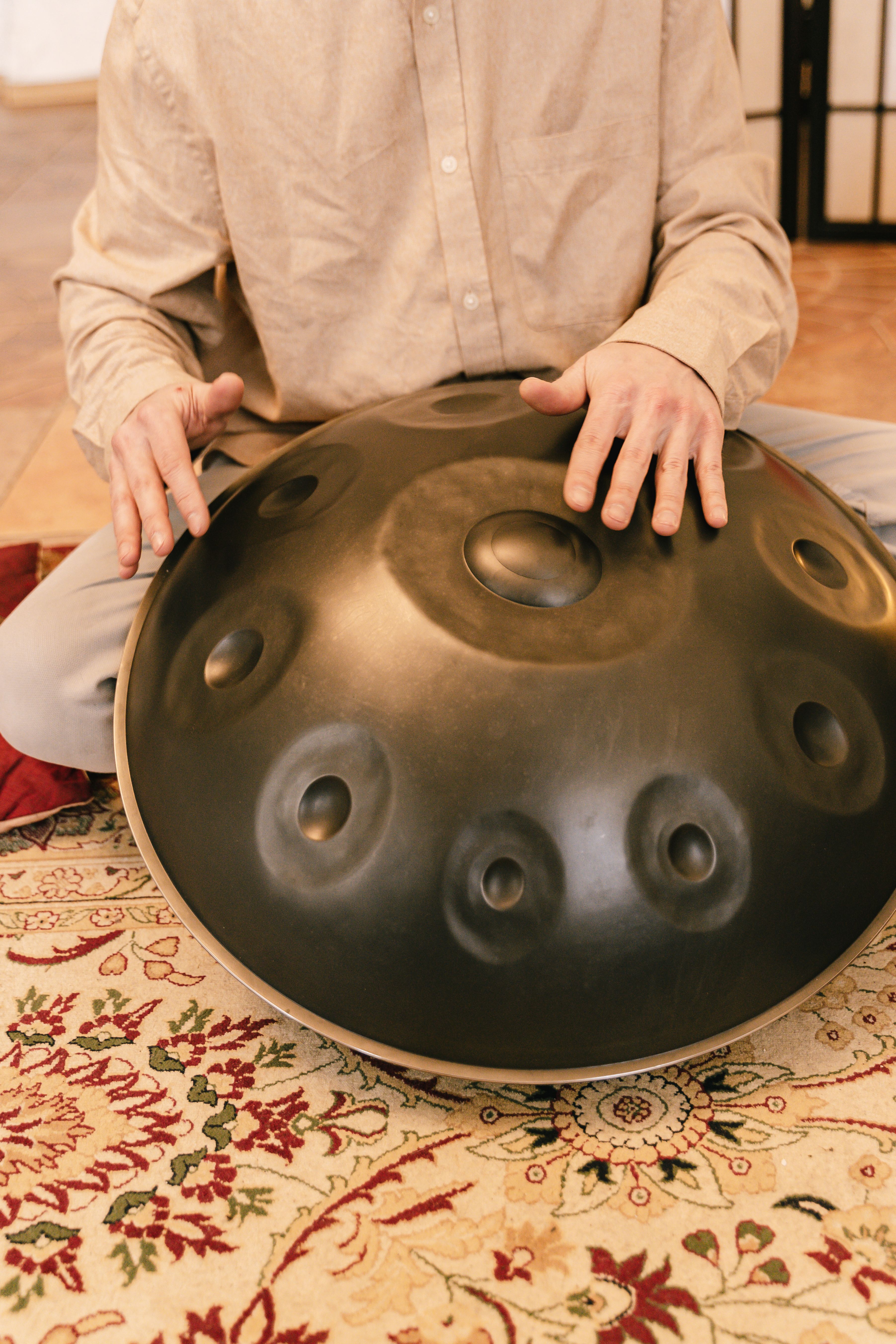 Close-Up Shot of a Person Using a Handpan · Free Stock Photo