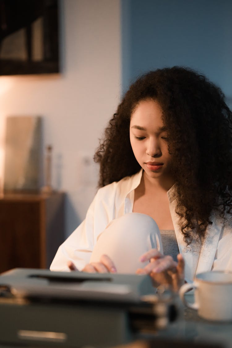 Selective Focus Of A Woman Typing A Script