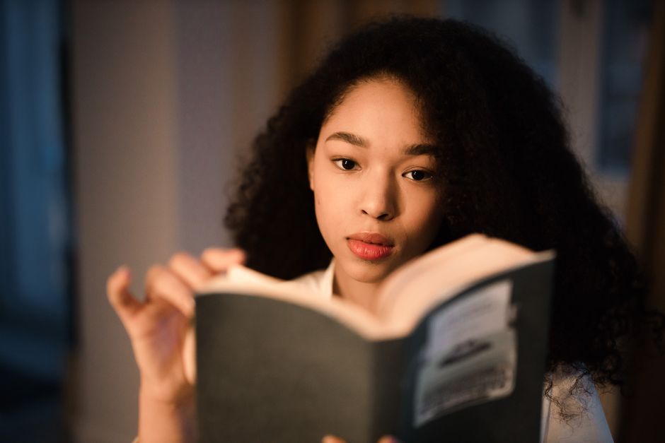 woman focused reading clear mind