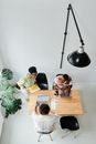 Man and Woman Sitting at the Table