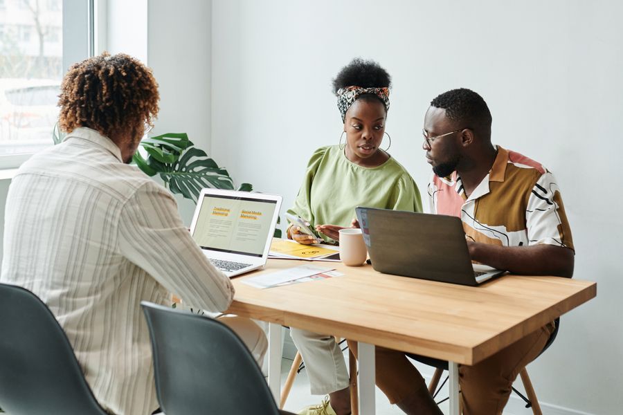 Business team comparing managed IT service pricing