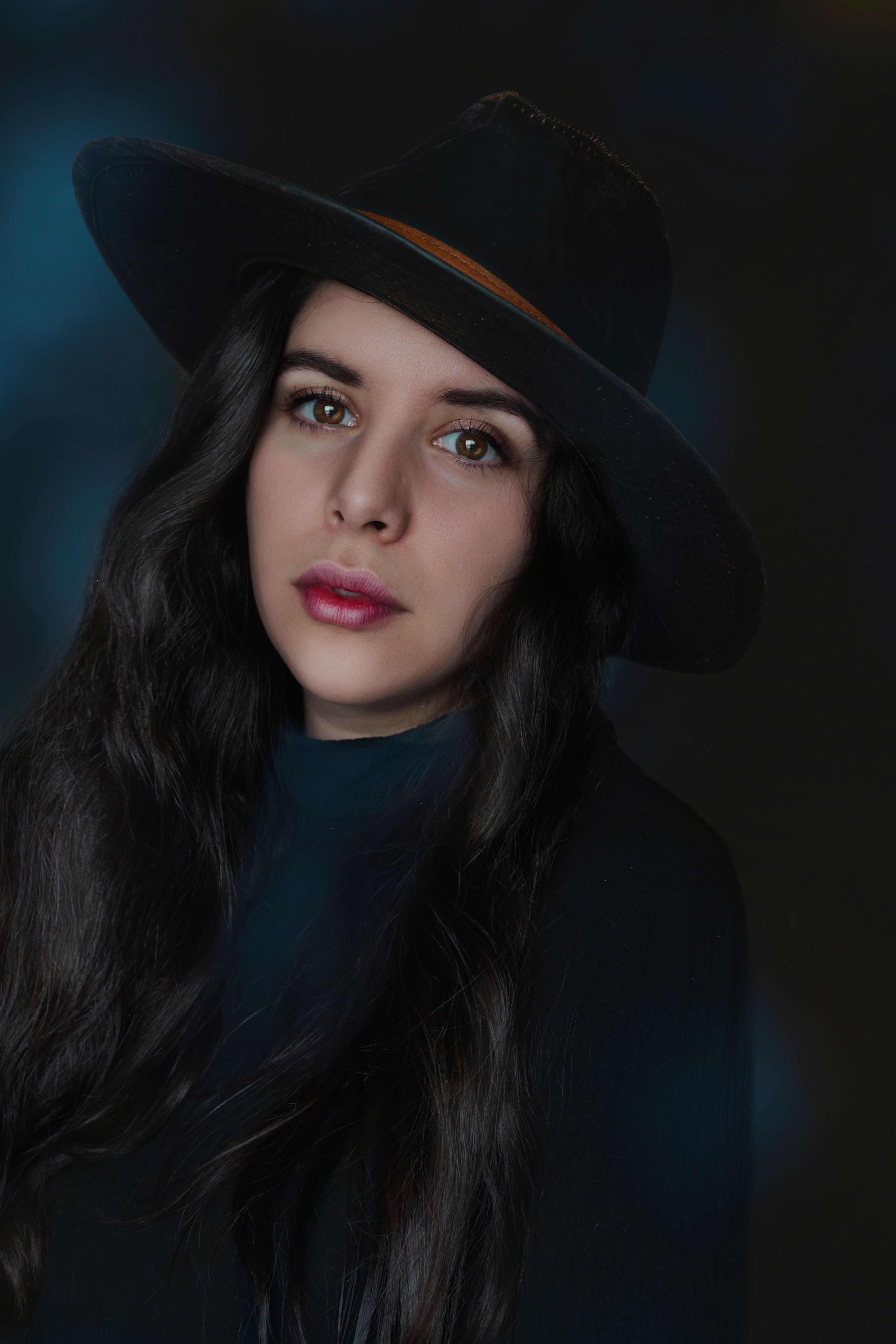 Beautiful Woman Wearing a Black Hat · Free Stock Photo