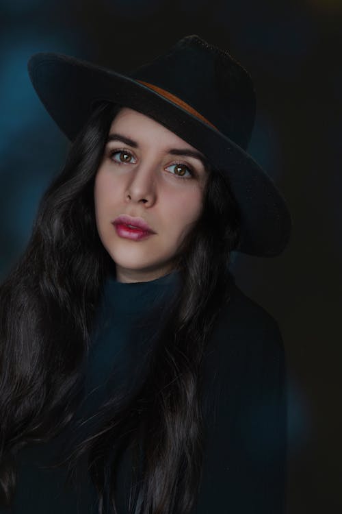 Beautiful Woman Wearing a Black Hat