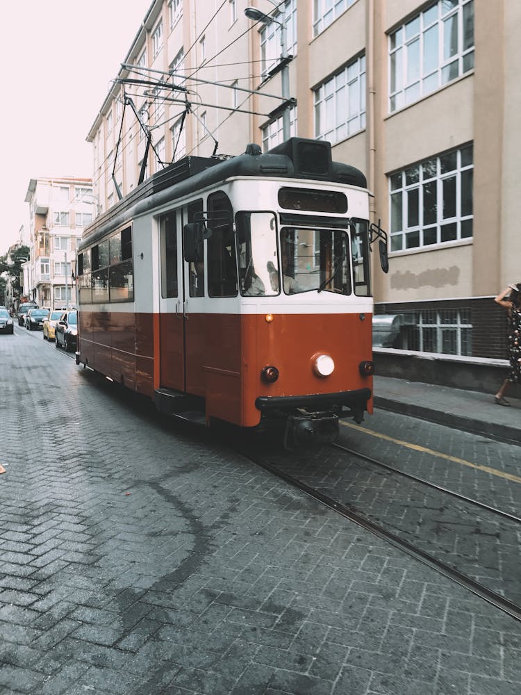 Tram Riding On Rails On Street