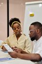 Selective Focus of a Woman Looking to Her Co-Worker