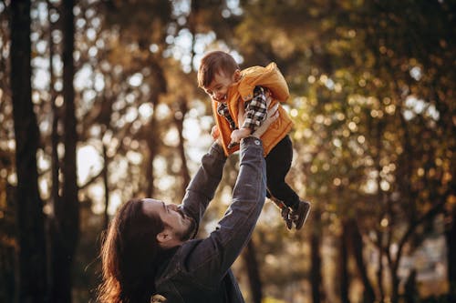 A Father Carrying His Son