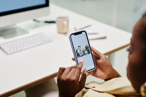 Close-Up Shot of a Person Using a Smartphone