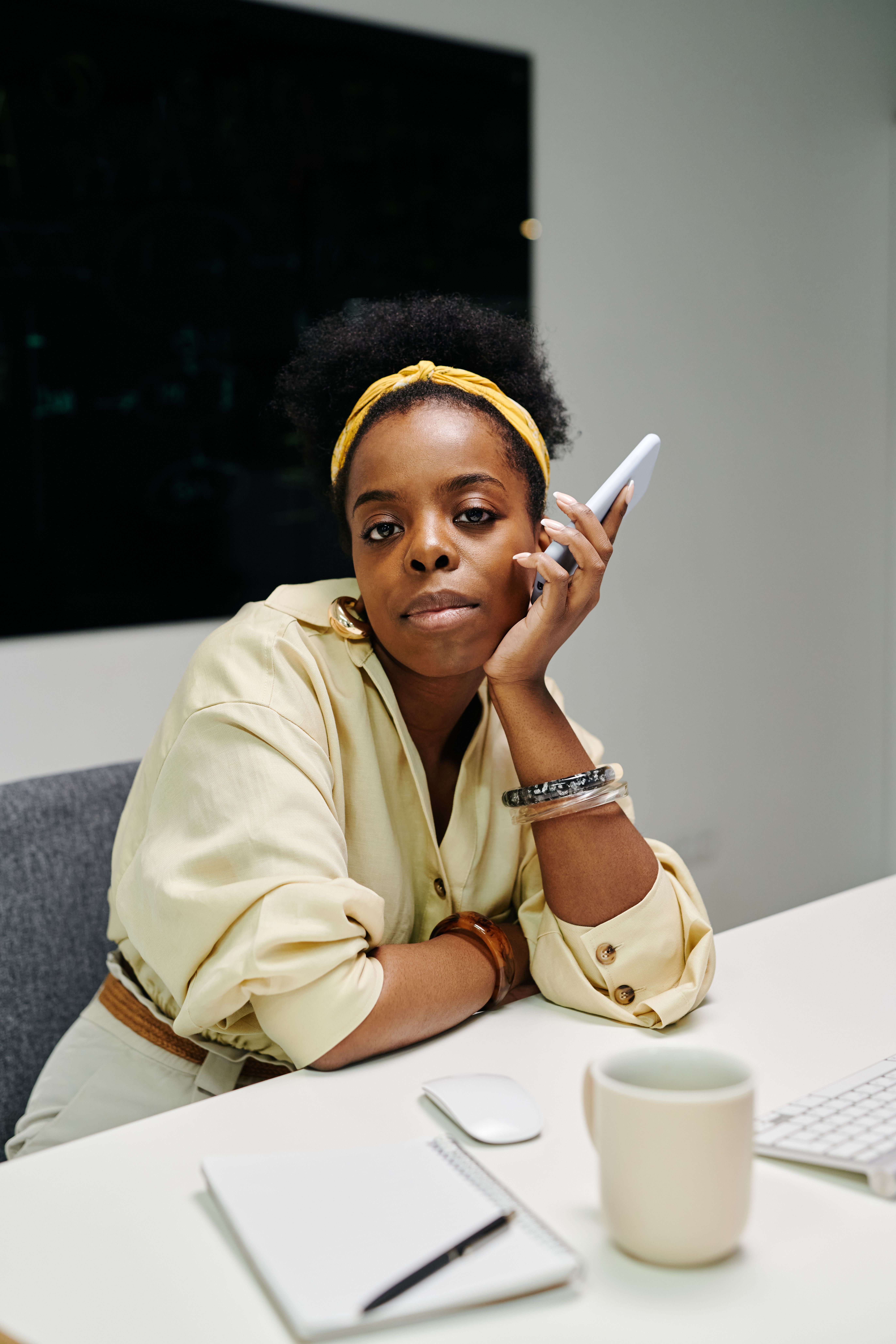 A Woman in White Shirt Sitting on a Chair · Free Stock Photo