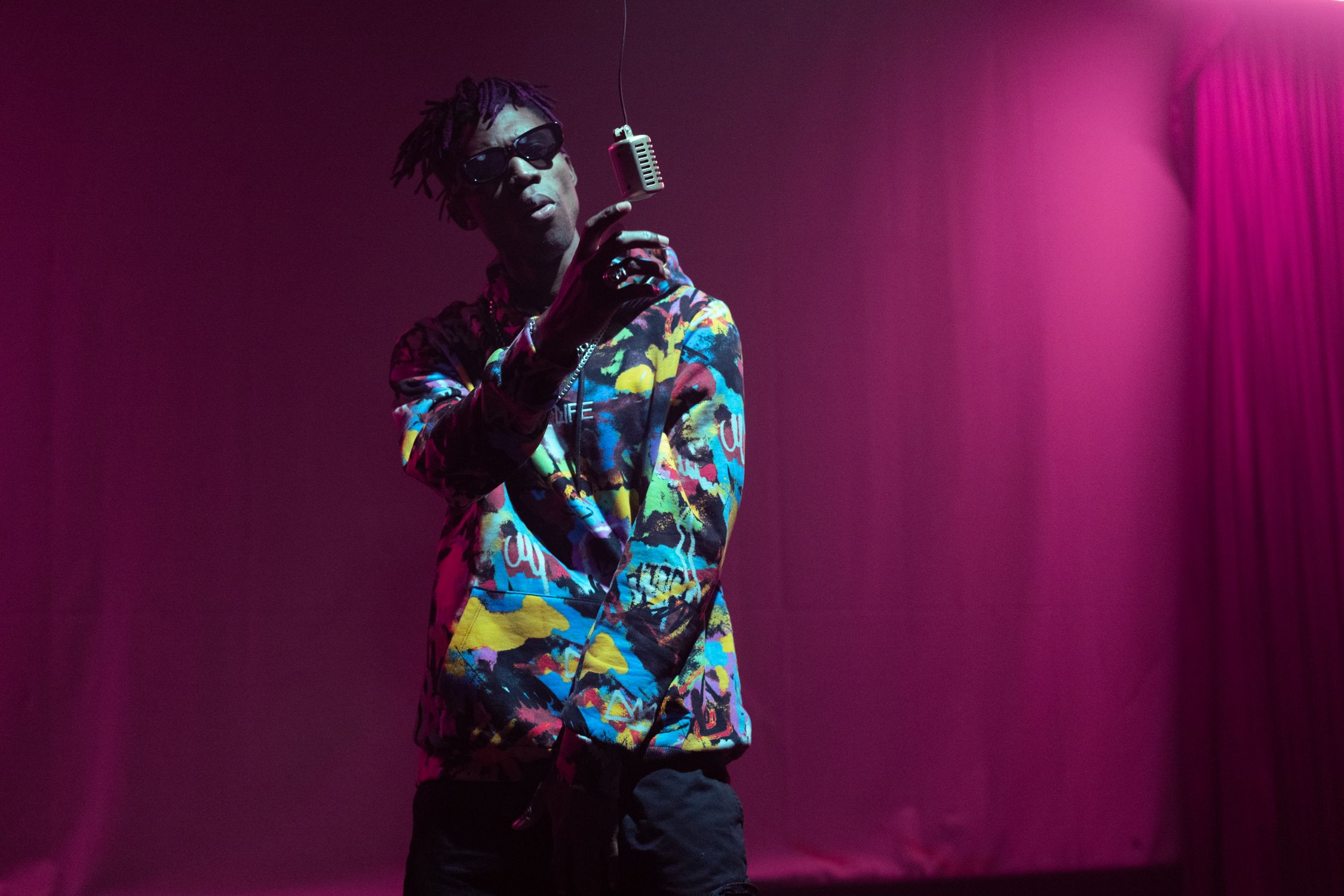 Rapper on Stage with Microphone · Free Stock Photo