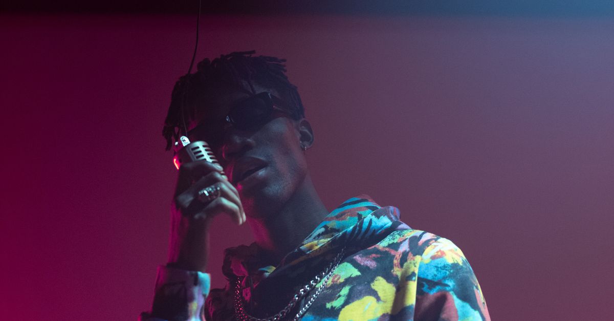 Vocal Rapper A Male Rapper Singing a Rap Song · Free Stock Photo